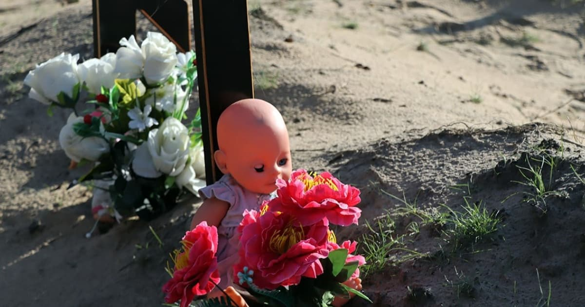 The bodies of five murdered children were exhumed in de-occupied Lyman