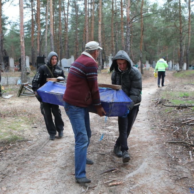 The bodies of three civilians shot by Russians in a car were exhumed in Izium — the press service of the National Police in the Kharkiv region